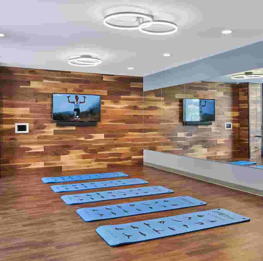 Yoga Studio with Fitness on Demand and large mirrors