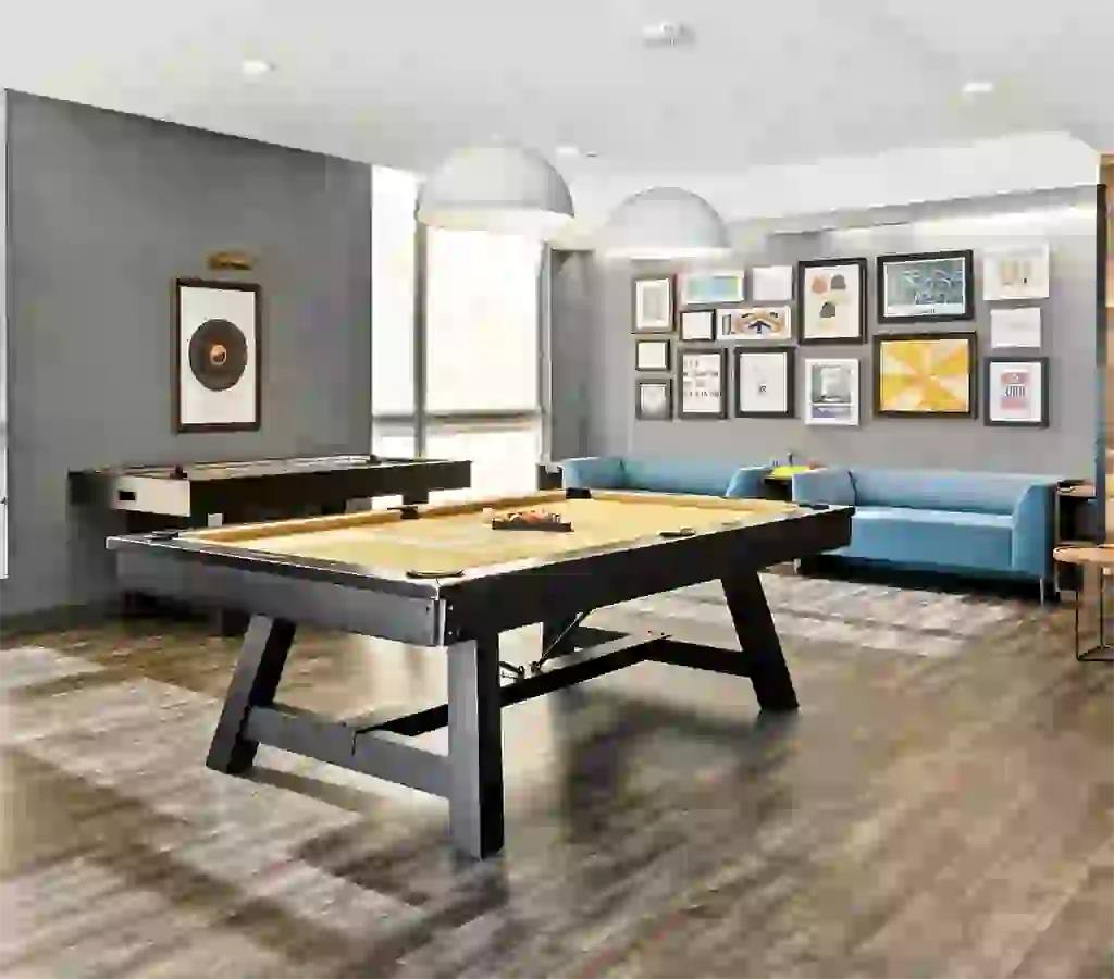 Club and Game Room with pool table, dining table, large screen TV, and kitchenette